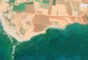 uniquely beachfront land for sale in mandria, paphos